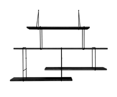 hanging shelf composed of one long ash wood planks lacqured in black, 3 small ash wood planks lacqured in black held together by 6 black steel bracket on white background