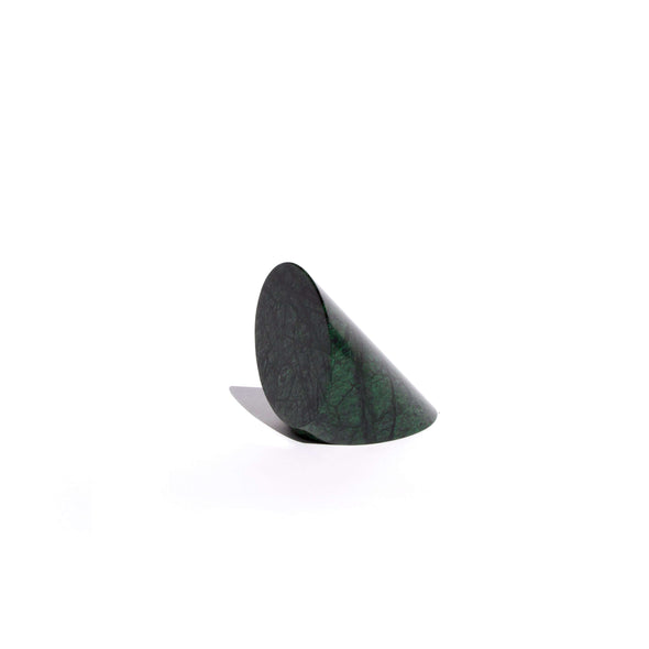 cylinder of green marble cut in a triangle shape